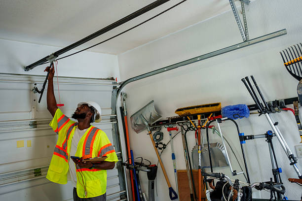Professional Garage Door Panel Replacement technician working in Danville, IA